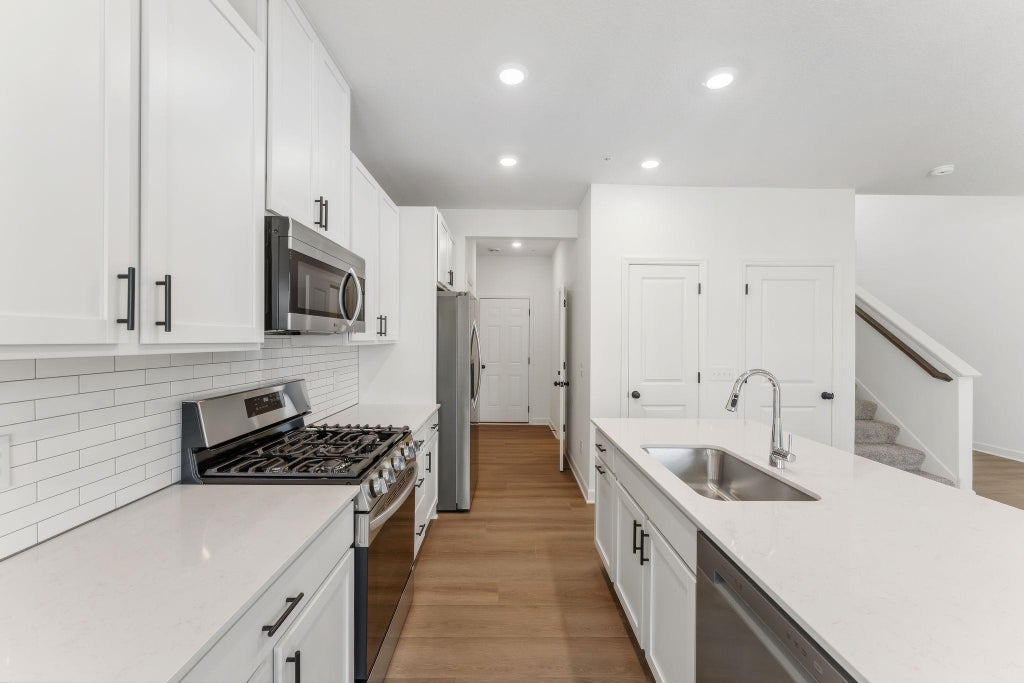 Photo of 4042 Hayward Avenue N, Oakdale, MN 55128 (MLS # 7157237)
