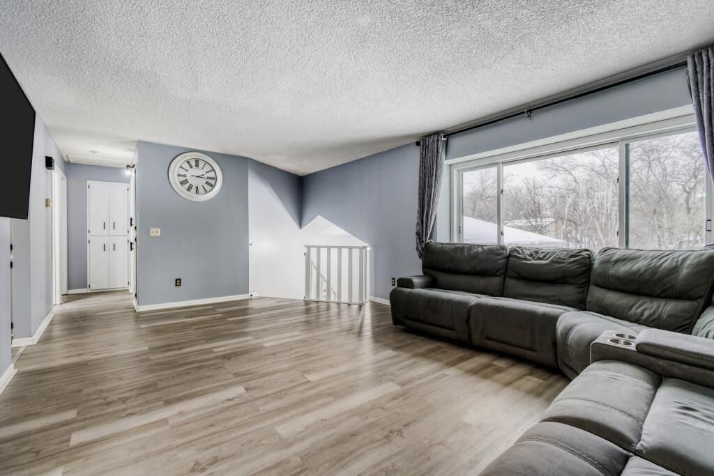 Photo of 398 120th Lane NW, Coon Rapids, MN 55448 (MLS # 7005944)