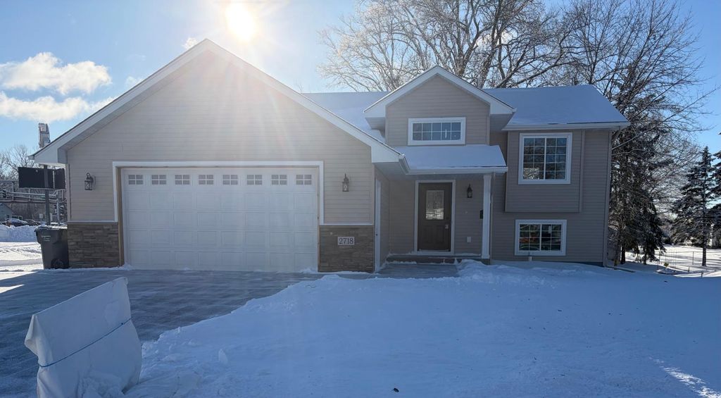 Photo of 2718 16th Avenue E, North Saint Paul, MN 55109 (MLS # 7005797)