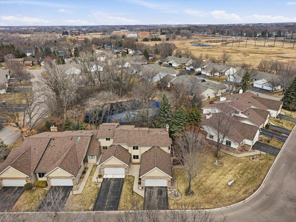 Photo of 561 Deer Ridge Lane S, Maplewood, MN 55119 (MLS # 7036574)