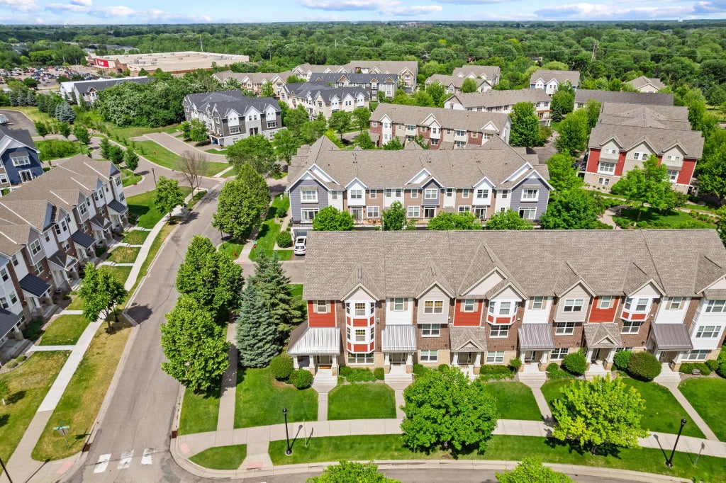 Photo of 11941 Emery Village Drive N #2101, Champlin, MN 55316 (MLS # 7089651)