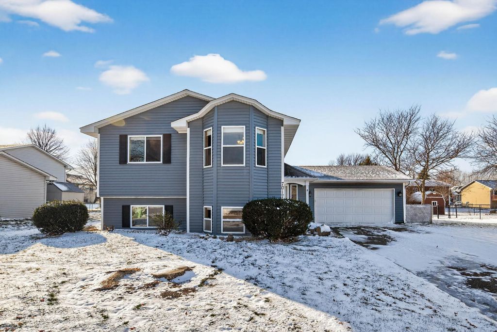 Photo of 7017 Setzler Parkway, Brooklyn Park, MN 55445 (MLS # 6818670)