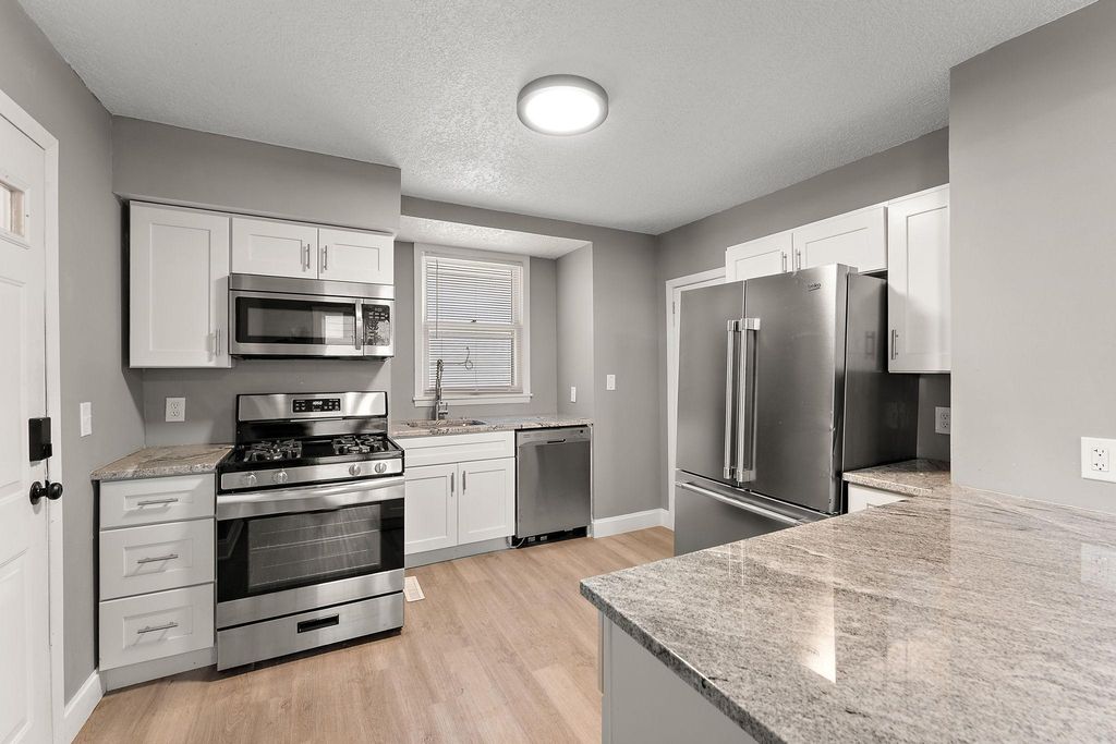 Photo of 303 Cesar Chavez Street, Saint Paul, MN 55107 (MLS # 6823704)