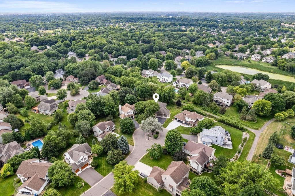 Photo of 9451 White Oaks Trail N, Champlin, MN 55316 (MLS # 7113692)
