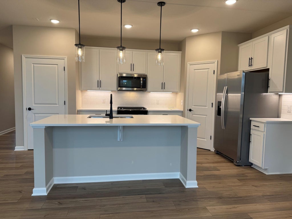 Photo of 6153 Goodview Avenue S, Cottage Grove, MN 55016 (MLS # 7094194)