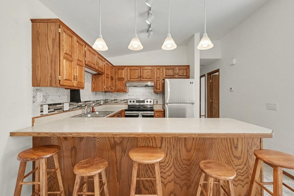 Photo of 11121 Edgewood Circle N, Champlin, MN 55316 (MLS # 7162931)