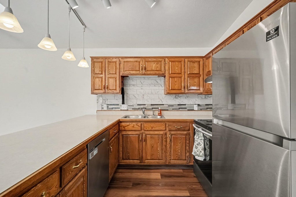 Photo of 11121 Edgewood Circle N, Champlin, MN 55316 (MLS # 7162931)