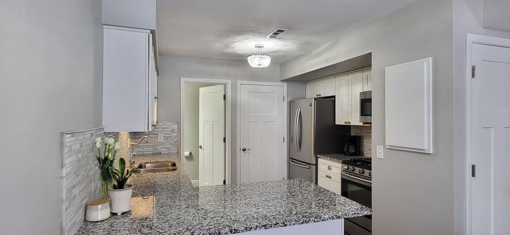 Photo of 9244 Indian Boulevard S, Cottage Grove, MN 55016 (MLS # 7012939)