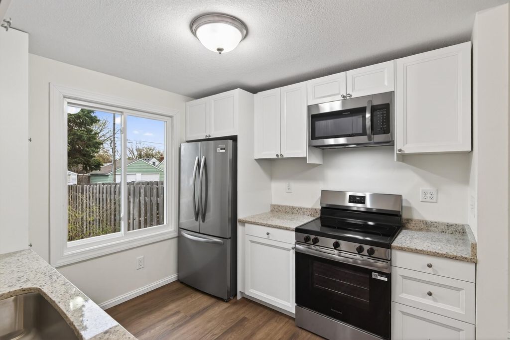 Photo of 4203 Lake Drive N, Robbinsdale, MN 55422 (MLS # 7053980)