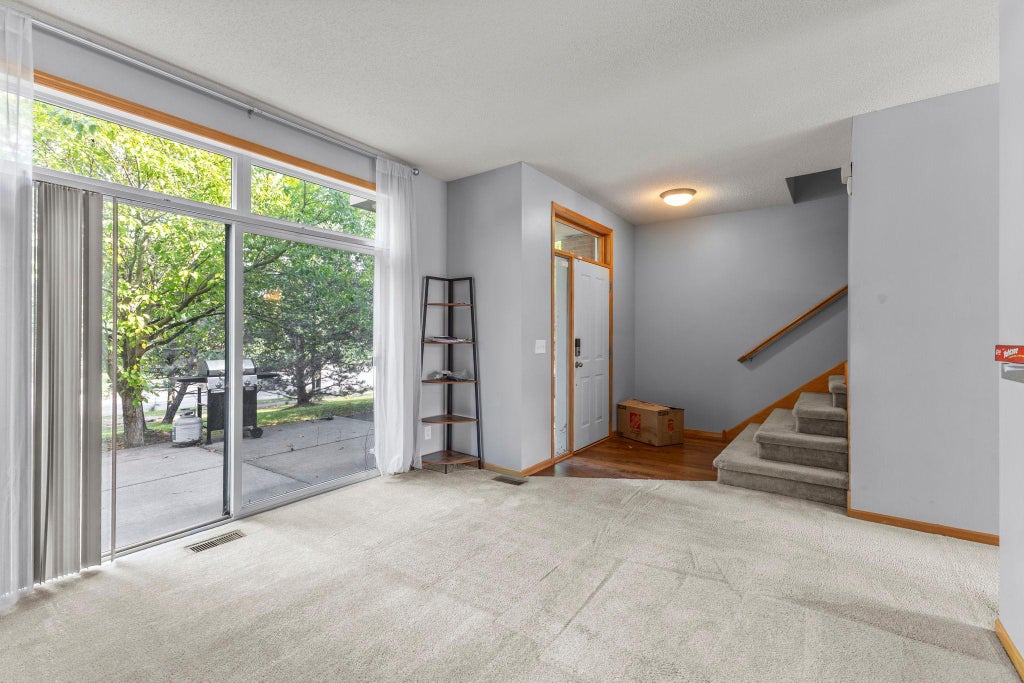 Photo of 7413 Zane Avenue N, Brooklyn Park, MN 55443 (MLS # 7160597)