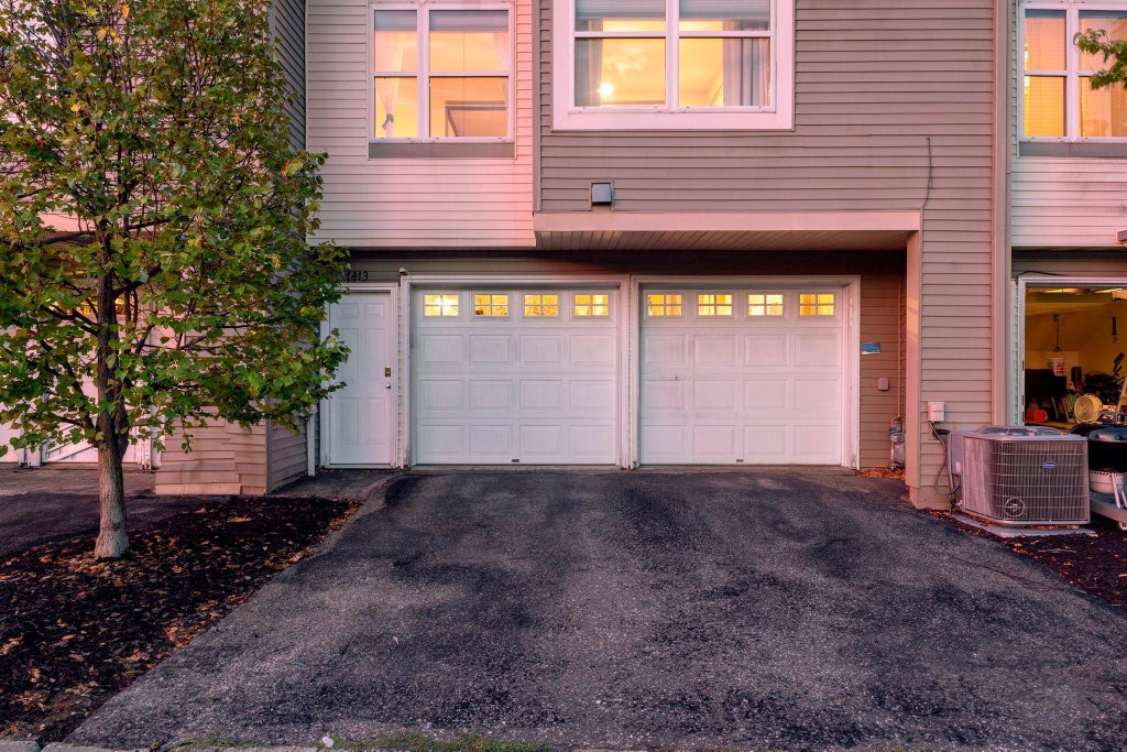 Photo of 7413 Zane Avenue N, Brooklyn Park, MN 55443 (MLS # 7160597)