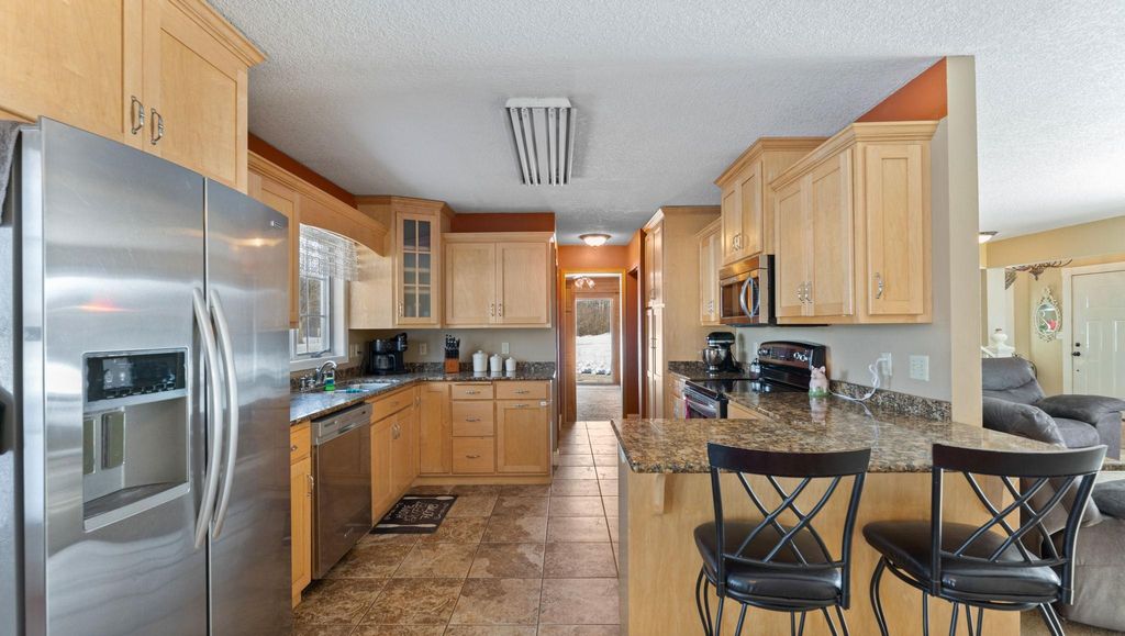 Photo of 12360 Ronneby Road NE, Foley, MN 56329 (MLS # 6767353)