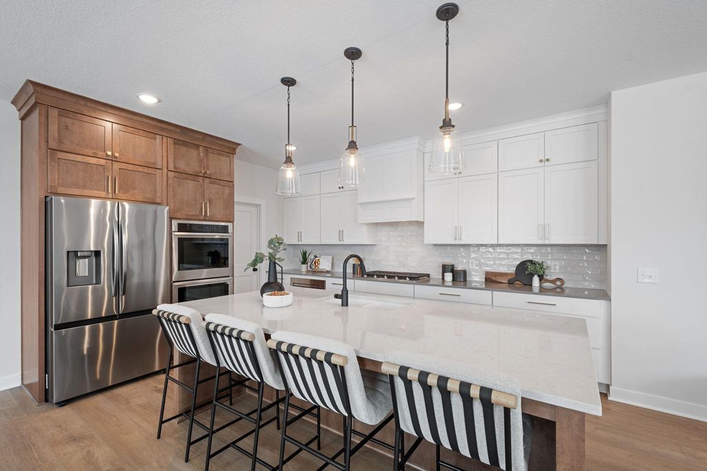 Photo of 10184 Queensland Lane N, Maple Grove, MN 55311 (MLS # 7028320)