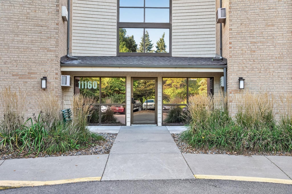 Photo of 11160 Anderson Lakes Parkway #214, Eden Prairie, MN 55344 (MLS # 7152991)