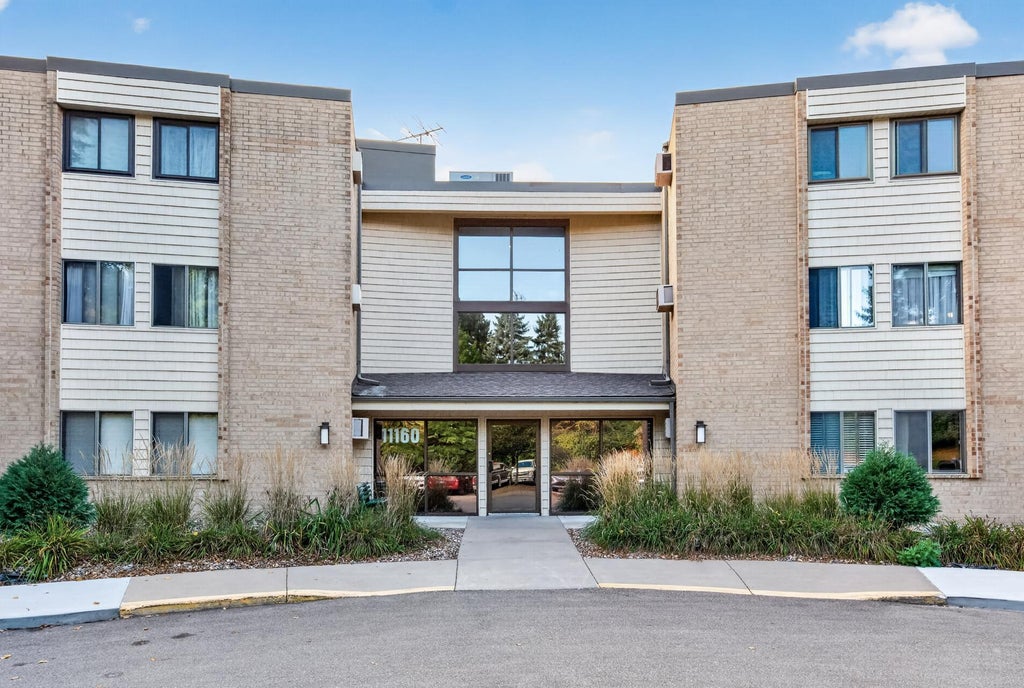 Photo of 11160 Anderson Lakes Parkway #214, Eden Prairie, MN 55344 (MLS # 7152991)