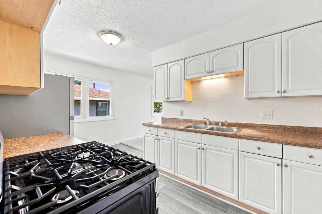 Photo of 518 37th Avenue NE, Minneapolis, MN 55421 (MLS # 7140460)