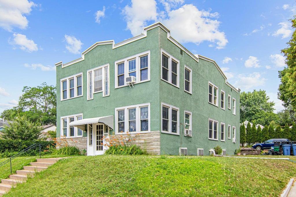 Photo of 1221 29th Avenue NE, Minneapolis, MN 55418 (MLS # 7093206)