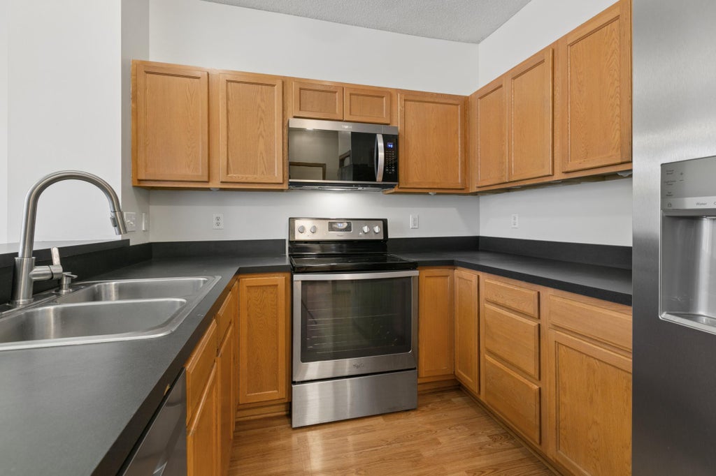 Photo of 7310 Bunker Lake Boulevard NW, Ramsey, MN 55303 (MLS # 7156180)