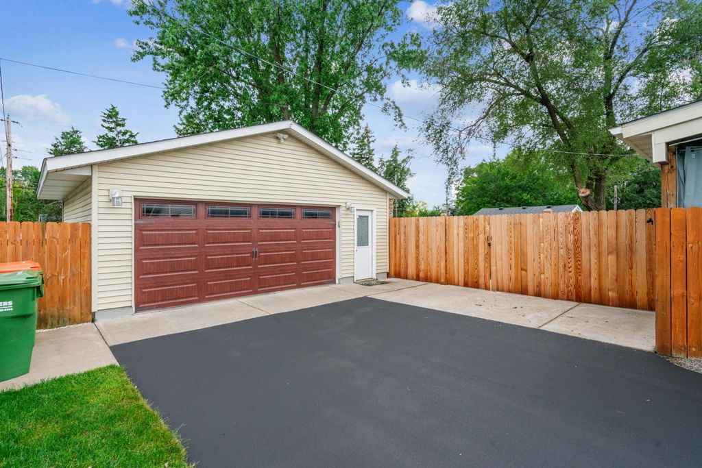 Photo of 208 106th Avenue NW, Coon Rapids, MN 55448 (MLS # 6785443)