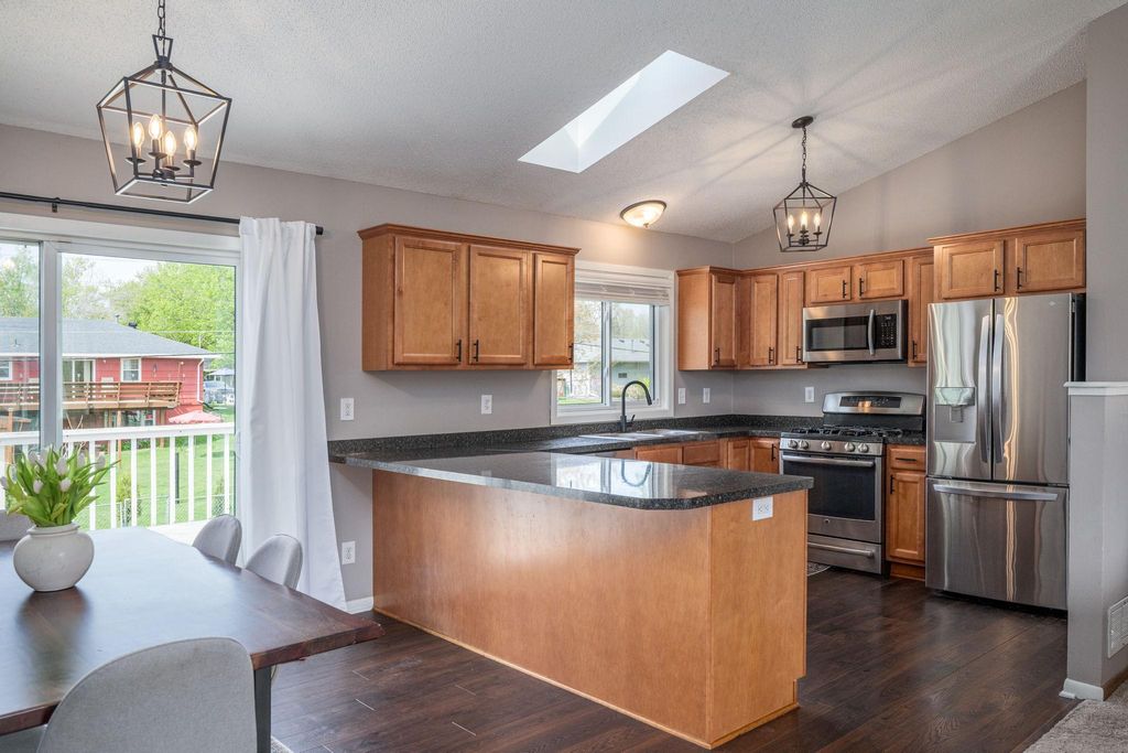 Photo of 633 108th Avenue NW, Coon Rapids, MN 55448 (MLS # 7069496)