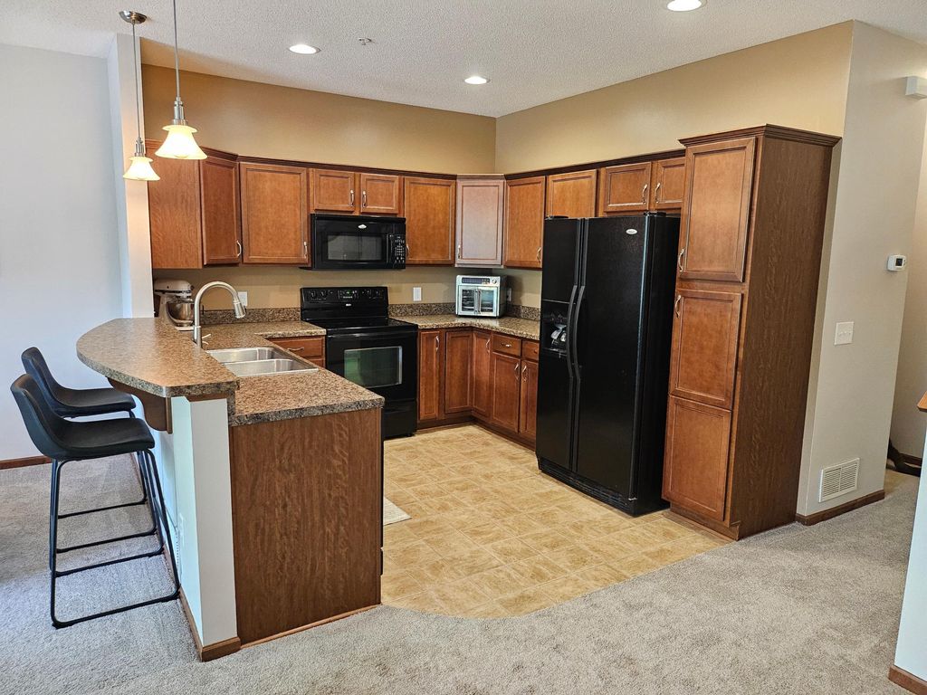 Photo of 8334 Emery Parkway N #2408, Champlin, MN 55316 (MLS # 7086249)