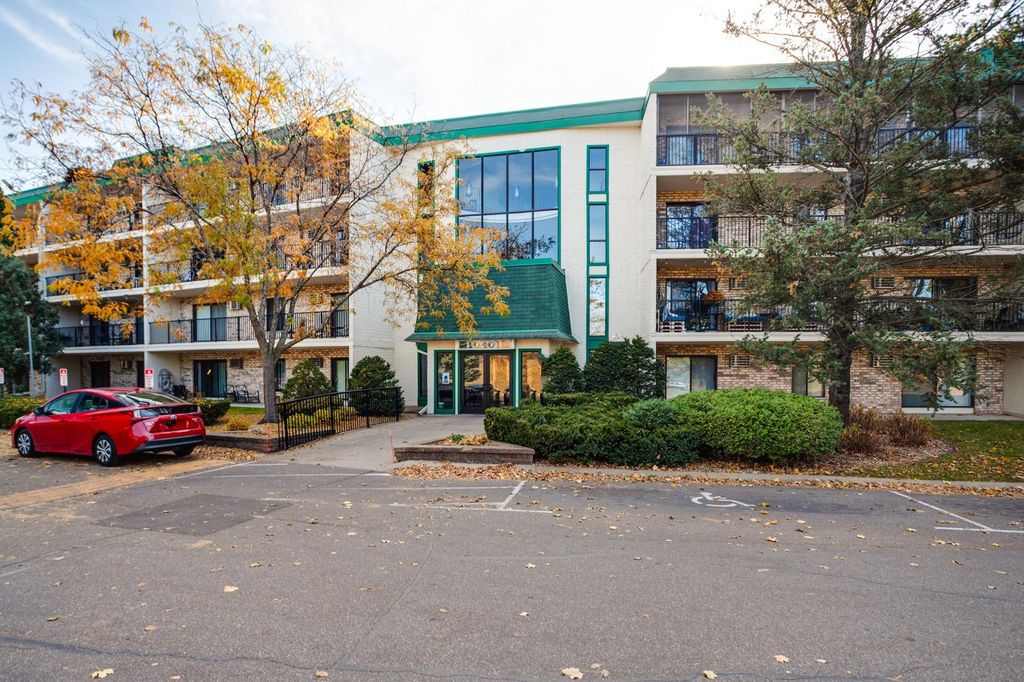 Photo of 10401 Cedar Lake Road #215, Hopkins, MN 55305 (MLS # 7077124)