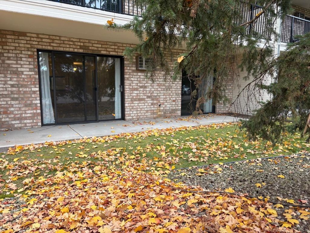 Photo of 10401 Cedar Lake Road #215, Hopkins, MN 55305 (MLS # 7077124)