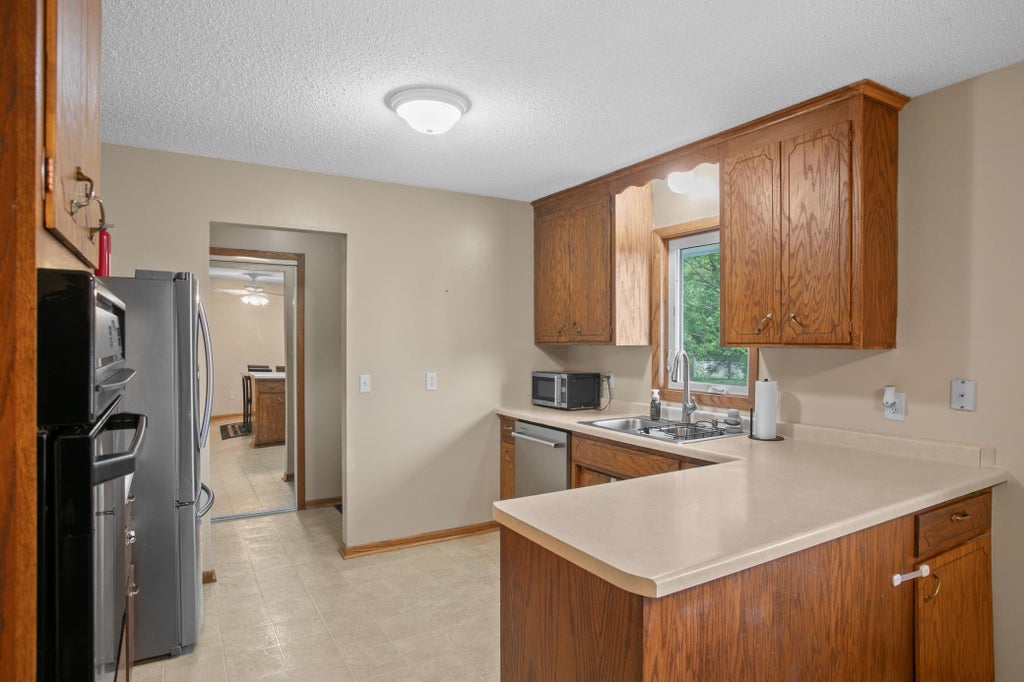 Photo of 1620 127th Avenue NW, Coon Rapids, MN 55448 (MLS # 7115812)