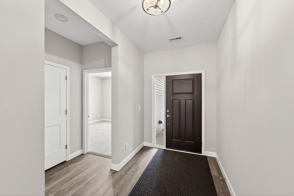 Photo of 1419 Victory Lane NE, Isanti, MN 55040 (MLS # 7008325)