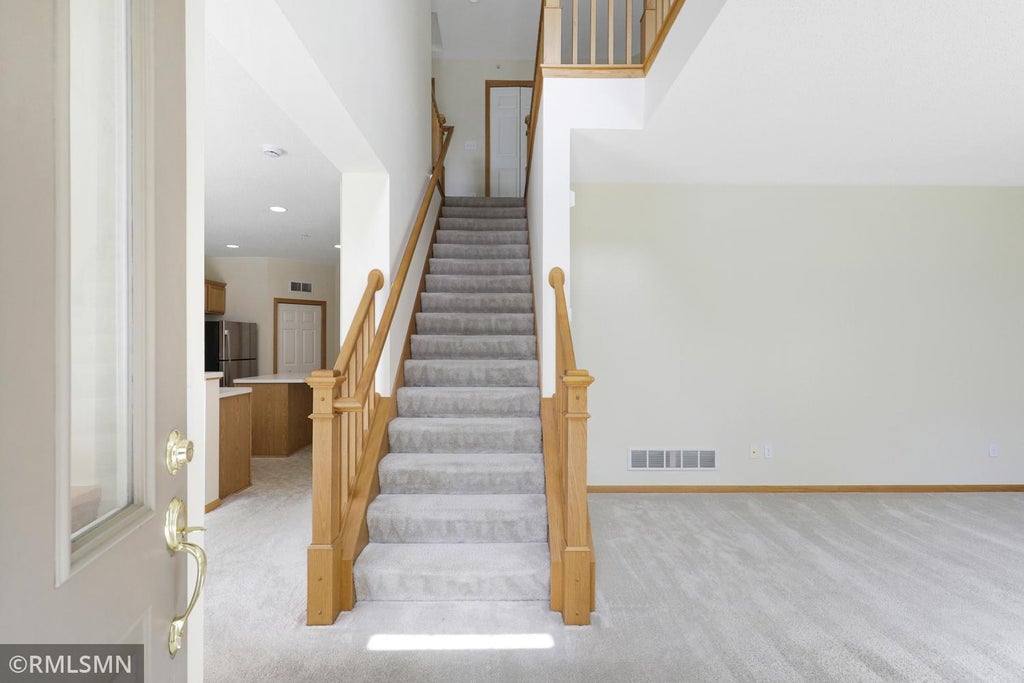 Photo of 12155 Vermillion Street NE #H, Blaine, MN 55449 (MLS # 7090214)