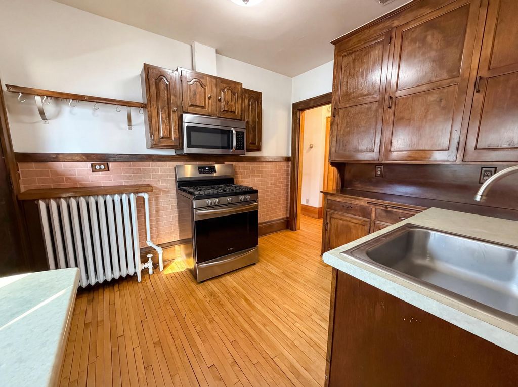 Photo of 1495 Saint Clair Avenue, North Saint Paul, MN 55105 (MLS # 7031830)