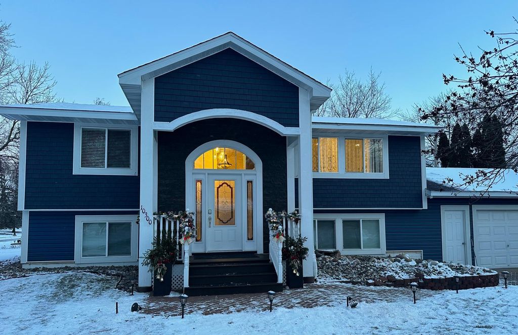 Photo of 10300 Parkview Lane, Champlin, MN 55316 (MLS # 7000253)