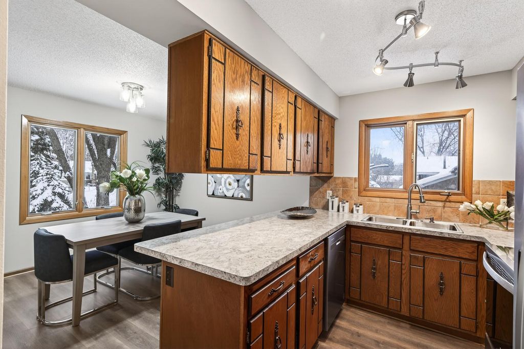 Photo of 10549 Lancaster Lane N, Maple Grove, MN 55369 (MLS # 6826684)