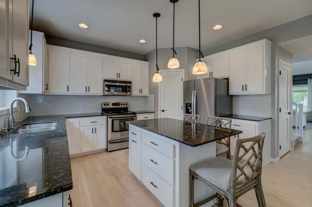 Photo of 3412 Walden Drive, Woodbury, MN 55129 (MLS # 7110034)
