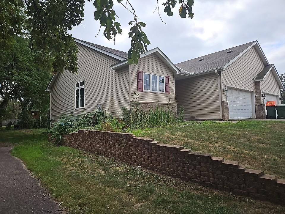 Photo of 388 107th Lane NW, Coon Rapids, MN 55448 (MLS # 7128242)