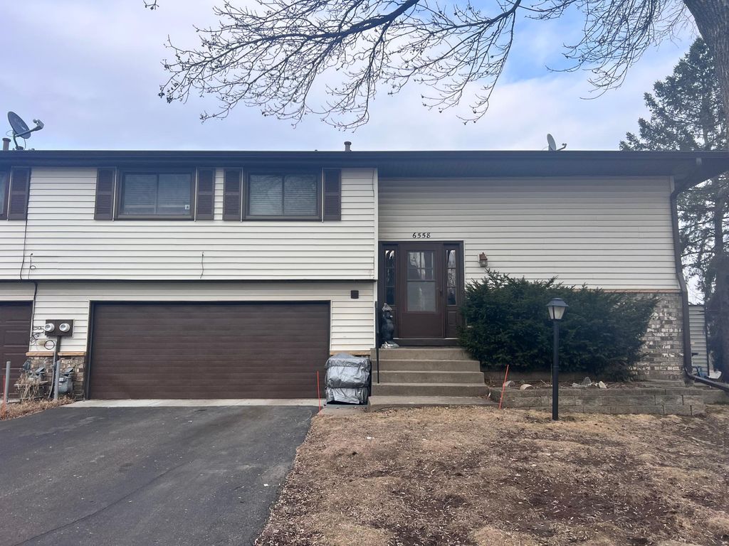 Photo of 6558 Upper 35th Street N, Oakdale, MN 55128 (MLS # 7029284)
