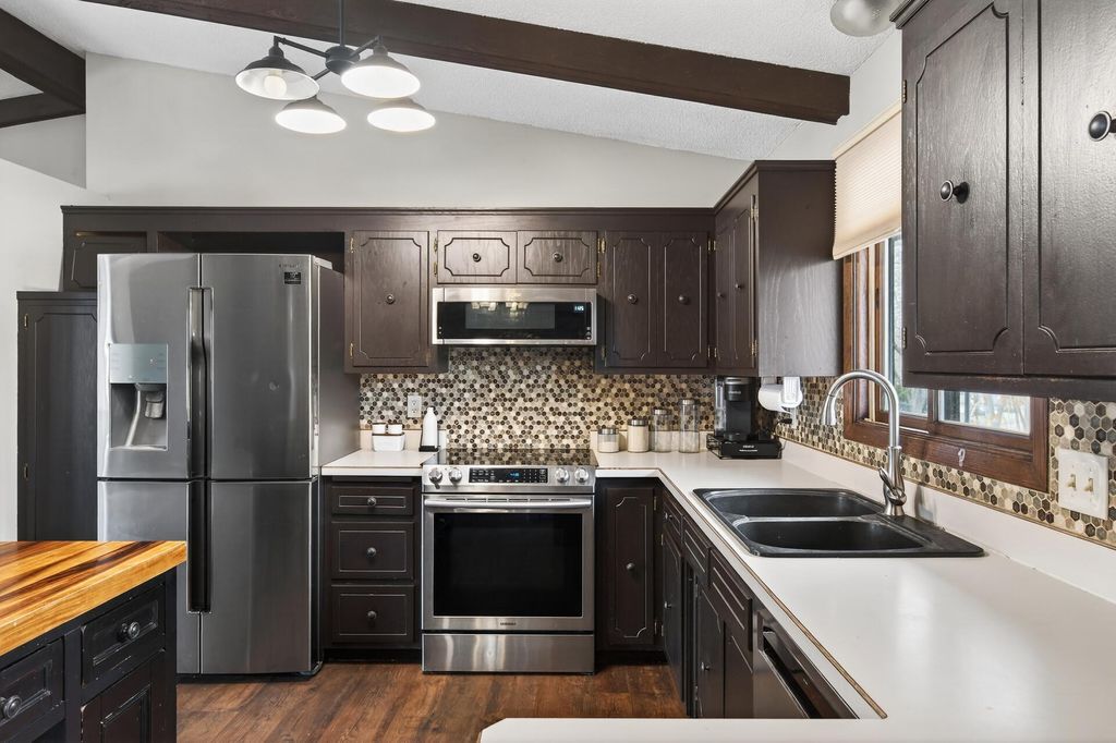 Photo of 8436 Palm Street NW, Coon Rapids, MN 55433 (MLS # 7032498)