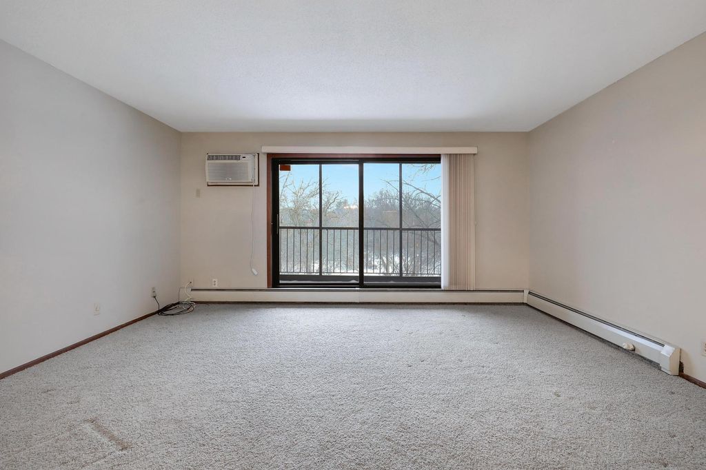 Photo of 10451 Greenbrier Road #211, Minnetonka, MN 55305 (MLS # 7020608)