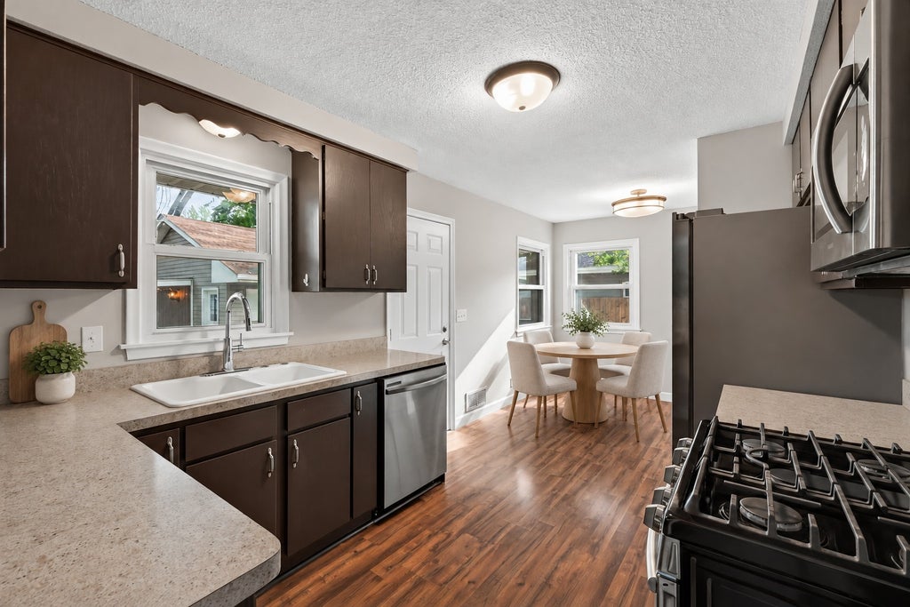 Photo of 3045 116th Avenue NW, Coon Rapids, MN 55433 (MLS # 7141054)