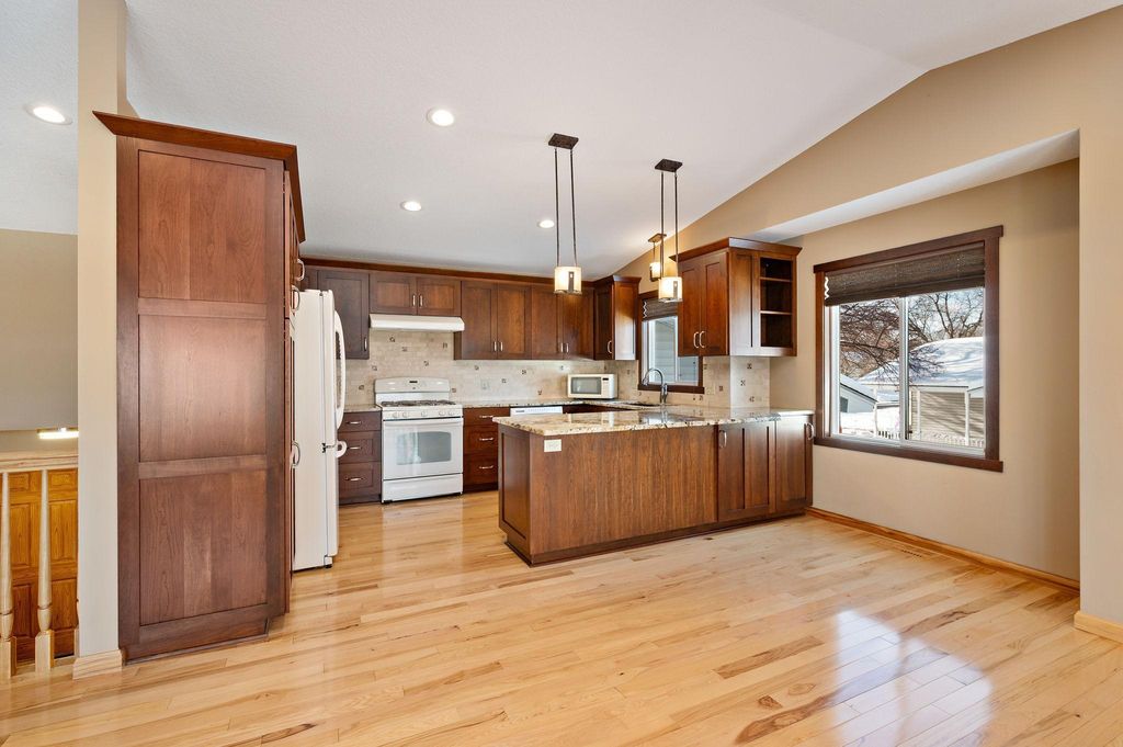 Photo of 7606 116th Avenue N, Champlin, MN 55316 (MLS # 7000878)