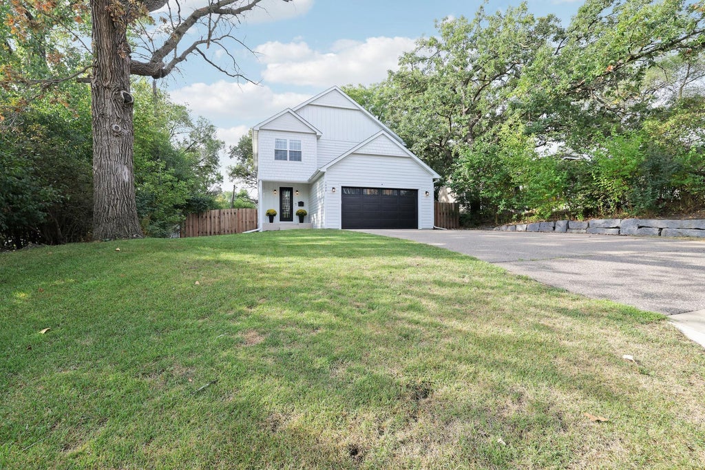 Photo of 1430 Division Street, Hopkins, MN 55343 (MLS # 7067323)