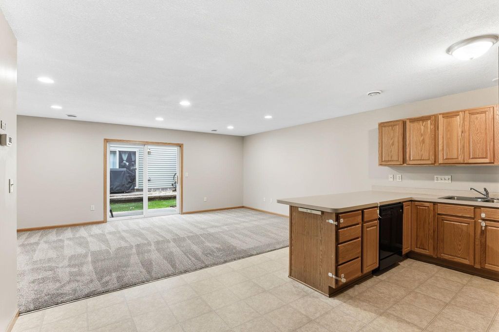 Photo of 6372 13TH Street N, Oakdale, MN 55128 (MLS # 7032063)