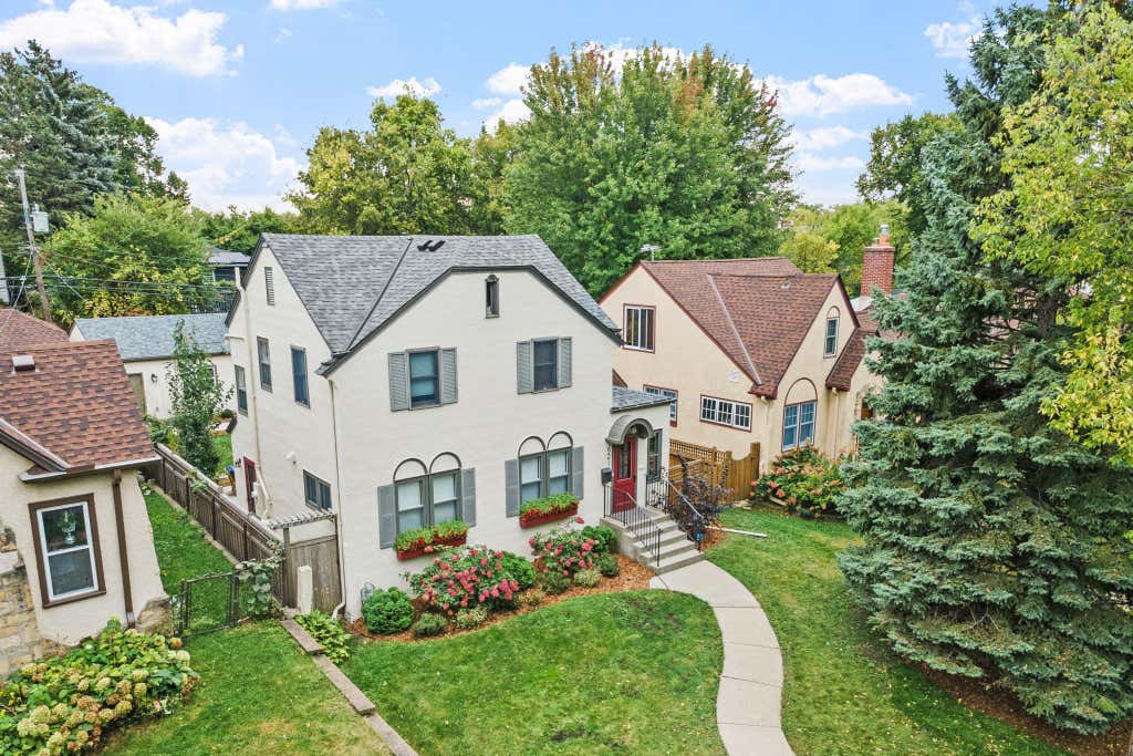 Photo of 621 Cedar Lake Road S, Minneapolis, MN 55405 (MLS # 7118309)