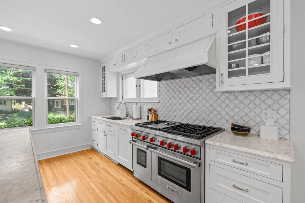 Photo of 621 Cedar Lake Road S, Minneapolis, MN 55405 (MLS # 7118309)