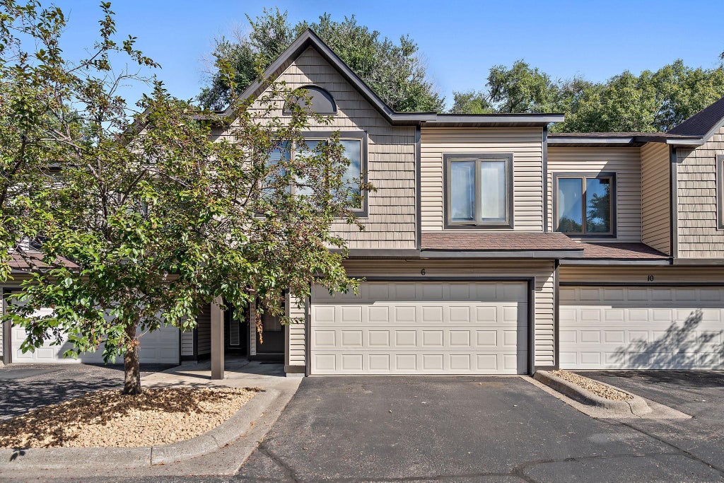 Photo of 6 110th Lane NW, Coon Rapids, MN 55448 (MLS # 7147411)