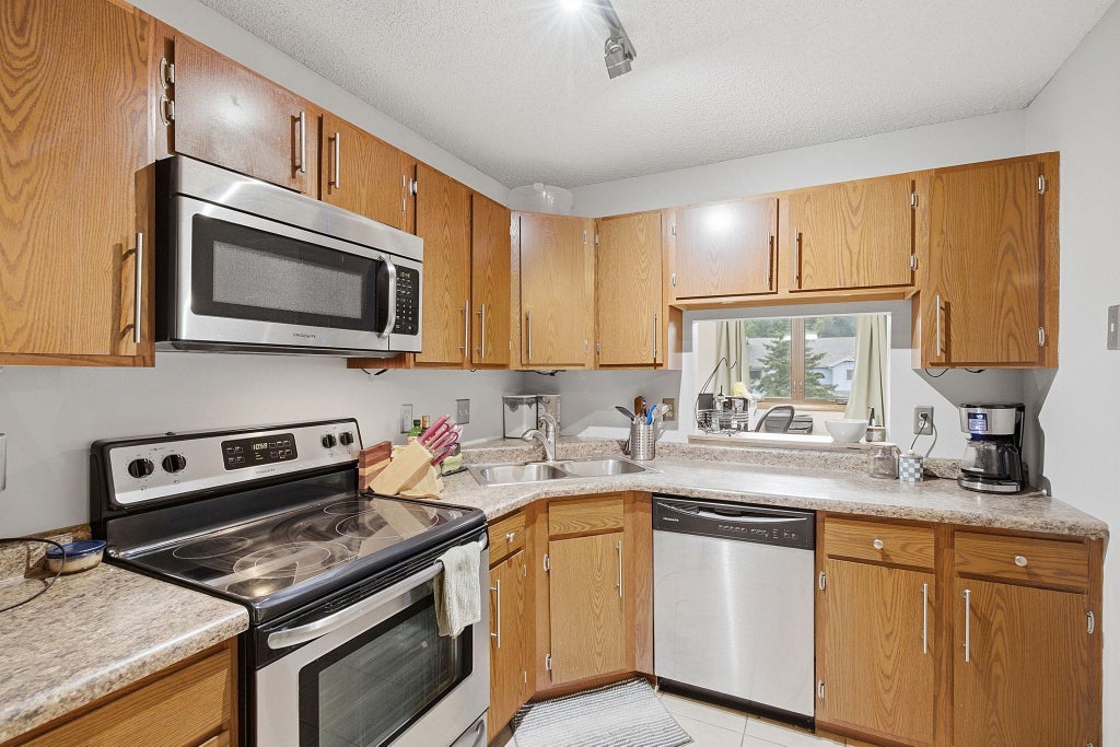 Photo of 1580 Wheelock Lane #205, Saint Paul, MN 55117 (MLS # 7084478)