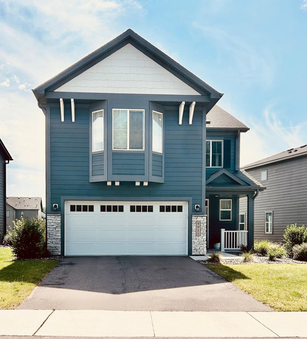 Photo of 9931 Bluebird Street NW, Coon Rapids, MN 55433 (MLS # 7084966)