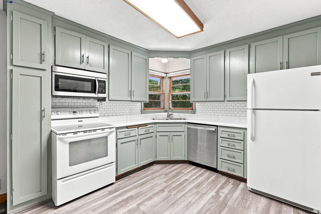 Photo of 5355 Northport Drive, Brooklyn Center, MN 55429 (MLS # 7115962)