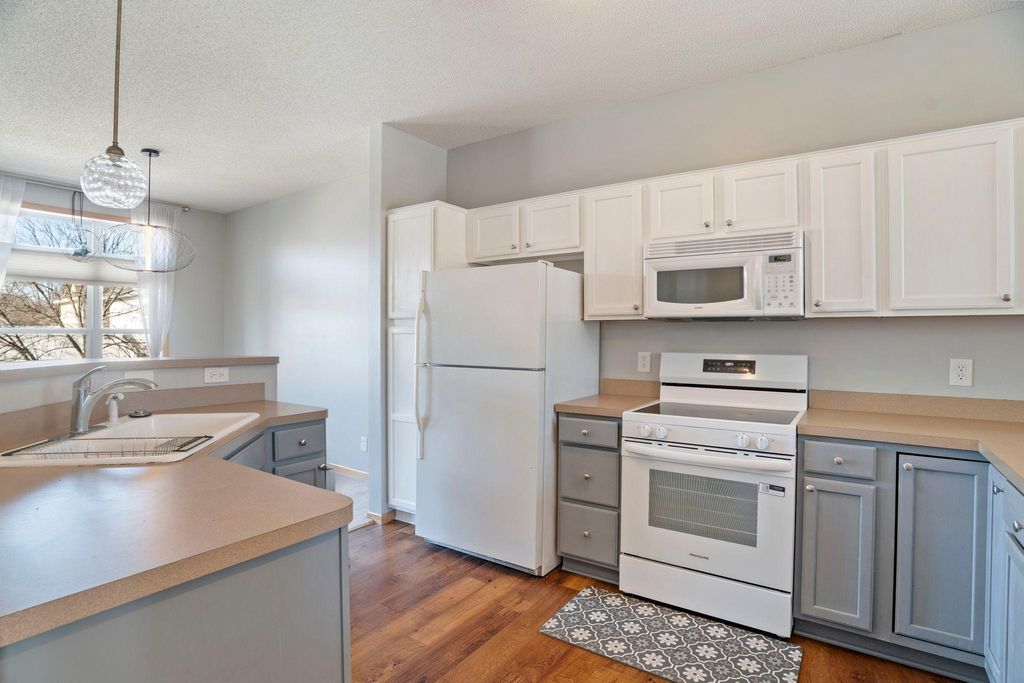 Photo of 7413 Zane Avenue N, Brooklyn Park, MN 55443 (MLS # 7001407)