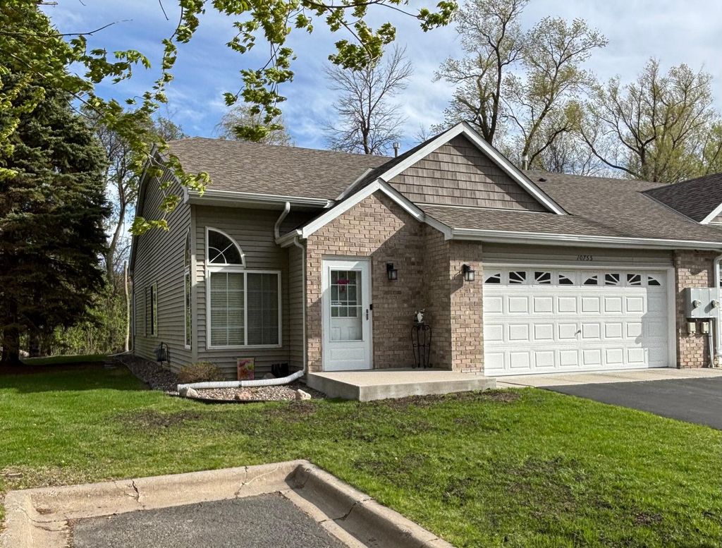Photo of 10755 Tamarack Circle NW, Coon Rapids, MN 55433 (MLS # 7068923)